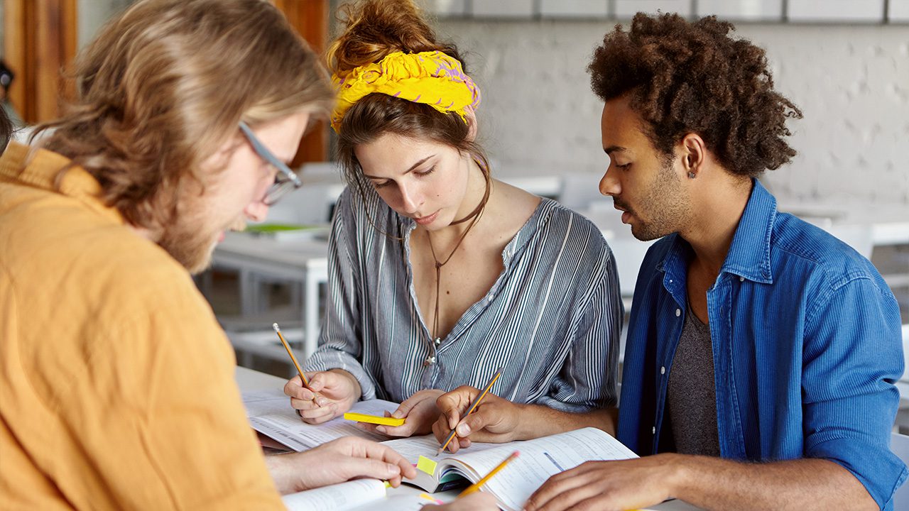 a group of people sitting at a table